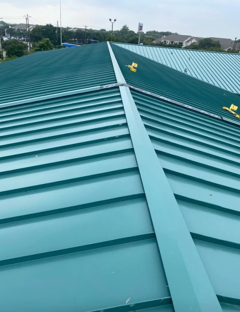 Green commercial metal roof ridge and valley for Metal Roof Repair in Lindale